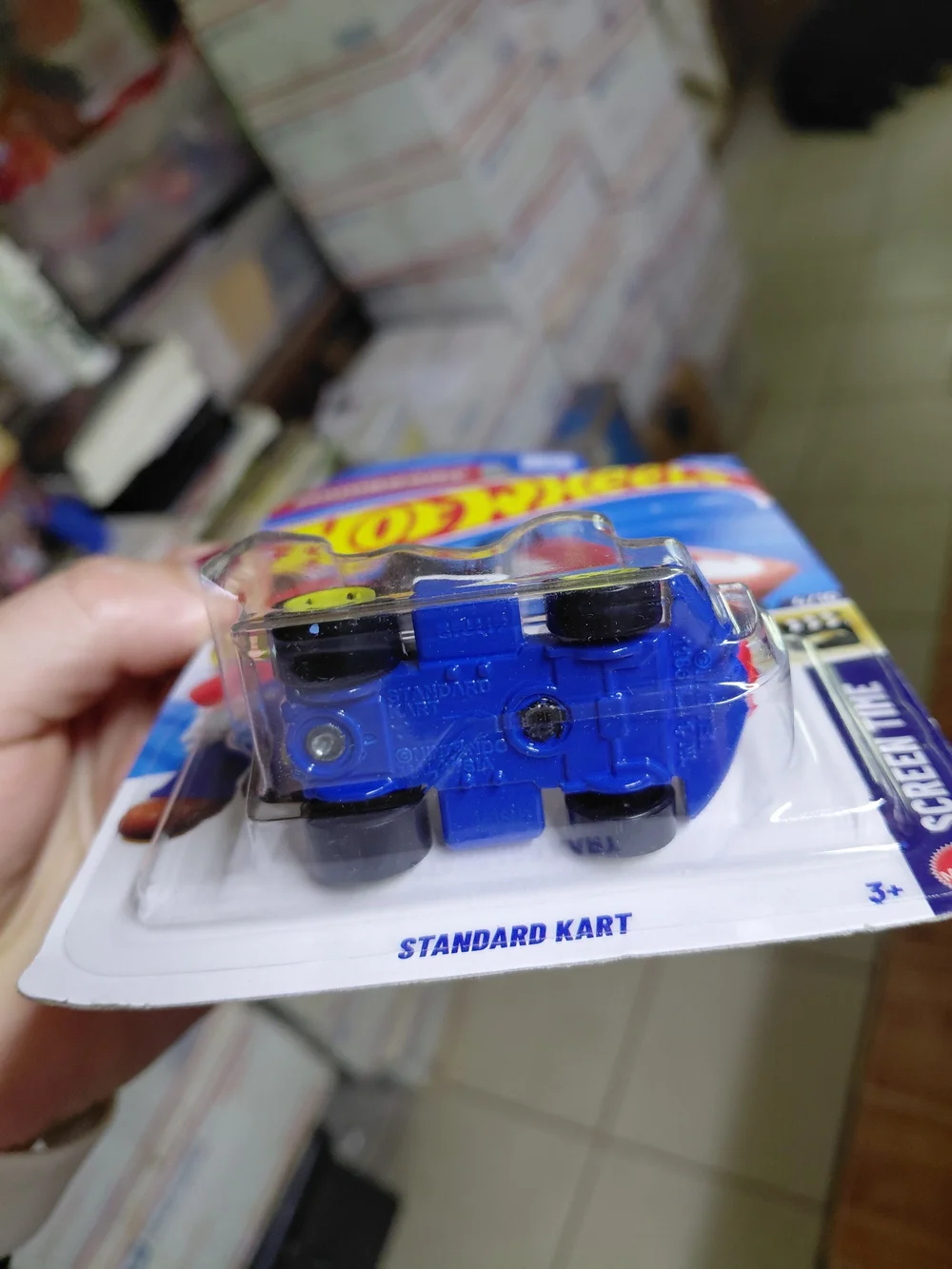 the Hot Wheels Mario Kart Standard Kart featuring Mario, part of the HW Screen T
